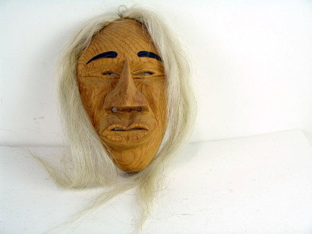 False Face Mask - John Elliot: 1985, Traditional hand carved Iroquois cedar false face mask "big lip grandfather" by John Elliot. 12" x 7"