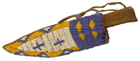 Sioux Knife Sheath: Traditional lazy stitch beaded sheath with cross figures plus a rawhide wrapped antique knife. Very good condition. Circa: Late 1900s Size: 10" x 3" sheath