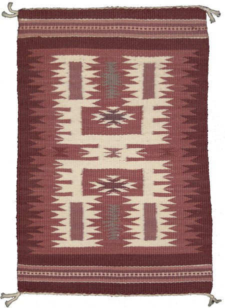 Navajo Rug/Weaving: Very fine weave storm pattern rug done in decorator friendly mauve and rose colors. Excellent condition. Circa: Late 1900s Size: 20" x 13"