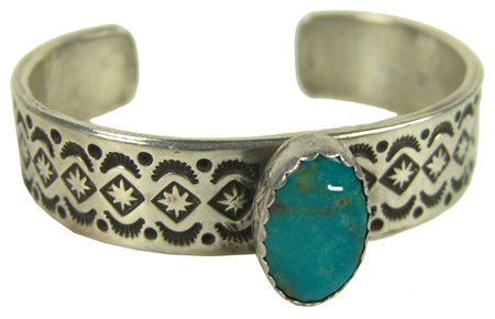 Navajo Bracelet - Pete Morgan: Exquisite heavy gauge stamped silver bracelet with single turquoise stone. Very good condition. Circa: Late 1900s Size: 5-1/2" + 1" x 3/4"