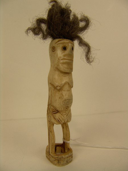 Antique Bone Carving: Unique old hand carved bone figure done in female form with sheep wool hair. This shows age and has nice patina and is in very good condition. Circa: Early to mid 1900s Size: 7'8" x 4-1/4" + hair