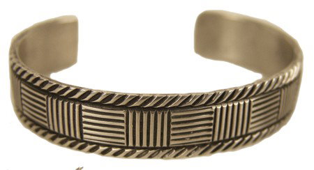 Navajo Bracelet - Gary Reeves: Late 1900s, Fine contemporary silver cuff bracelet with interesting stamped design. Very good condition. 5-7/8" x 1/2" + 1-1/4" gap