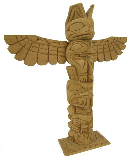 Northwest Coast Model Totem Pole- Ray Williams: Mid 1900s, Classic deep-relief carved Nootka (Nuu Chah Nulth) unfinished yellow cedar totem pole with (removable) eagle thunderbird wings. Very good condition. 12" x 12" x 3" + base