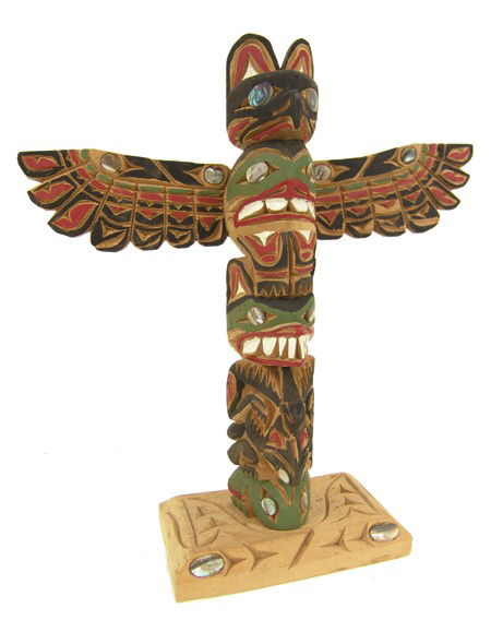 Northwest Coast Model Totem Pole - Ray Williams: Mid 1900s, Colorful Nootka (Nuu Chah Nulth) hand carved and painted deep-relief totem with (removable) wings, inlays, and carved base. Very good condition. 12" x 12" x 3"