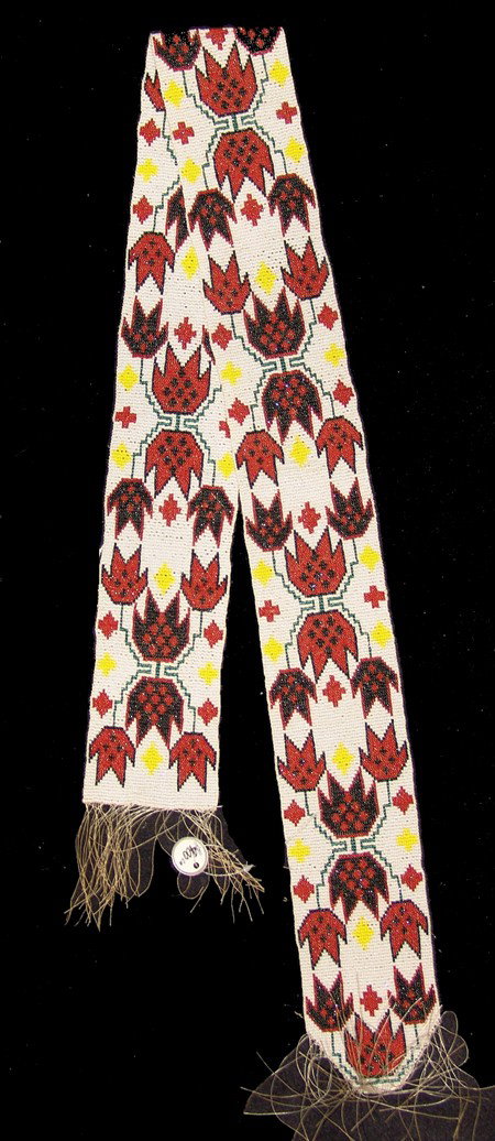 Winnebago Beaded Sash: Mid/Late 1900s, Beautiful loom beaded unfinished sash with striking geometric design done in traditional style. Very good condition. 3" x 45"