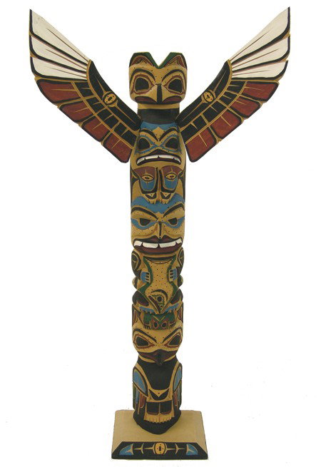NW Coast Model Totem Pole- Harvey & Josie Williams: 1980s, Very fine hand carved and painted alderwood totem pole with raven, kingfisher, and man with halibut figures; removable wings and carved base. Very good condition. 19"