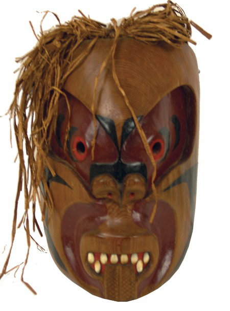 Northwest Coast Mask: Mid/Late 1900s, Impressive hand carved and painted cedar mask with cowrie shell teeth. Very good used condition (has hat and drape inside). 10" x 8-1/2" x 15"