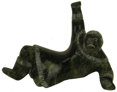 Eskimo Soapstone Sculpture- R. Thomas: 1980s, Signed original carving showing a semi-reclining man. Very good condition. 2-1/2" x 6-1/2" x 4"