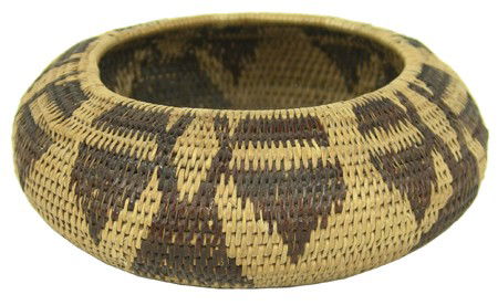 Pomo Basket: Early 1900s, Classic single rod low profile basketry bowl with rare foliate designs. Very good condition, a few missing stitches. 6" x 2-1/2"