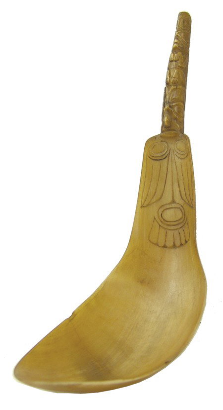Tlingit Horn Ladle: Early 1900s, Rare early hand carved sheep horn ladle with totemic carved handle. Very good condition. 13" x 4-1/2" x 6"