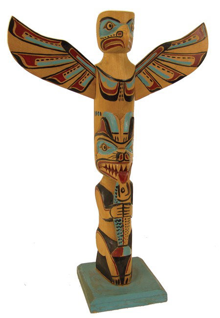 Northwest Coast Model Totem Pole - George Nelson: Late 1900s, Fine hand carved and painted red cedar totem with an eagle on top and a bear holding a salmon below. Very good condition. 14-1/2"