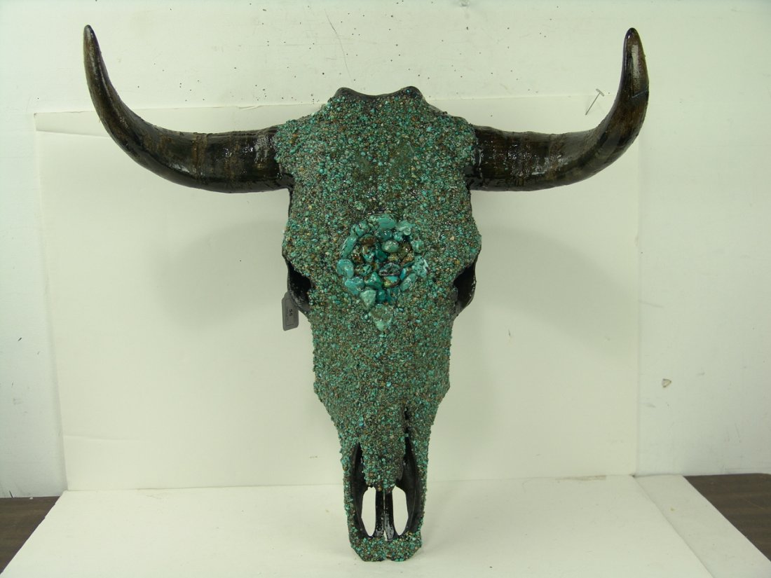 Turquoise Encrusted Skull: Beautiful turquoise encrusted steer skull. Very good condition. Size: 20" x 23" Circa: Late 1900s