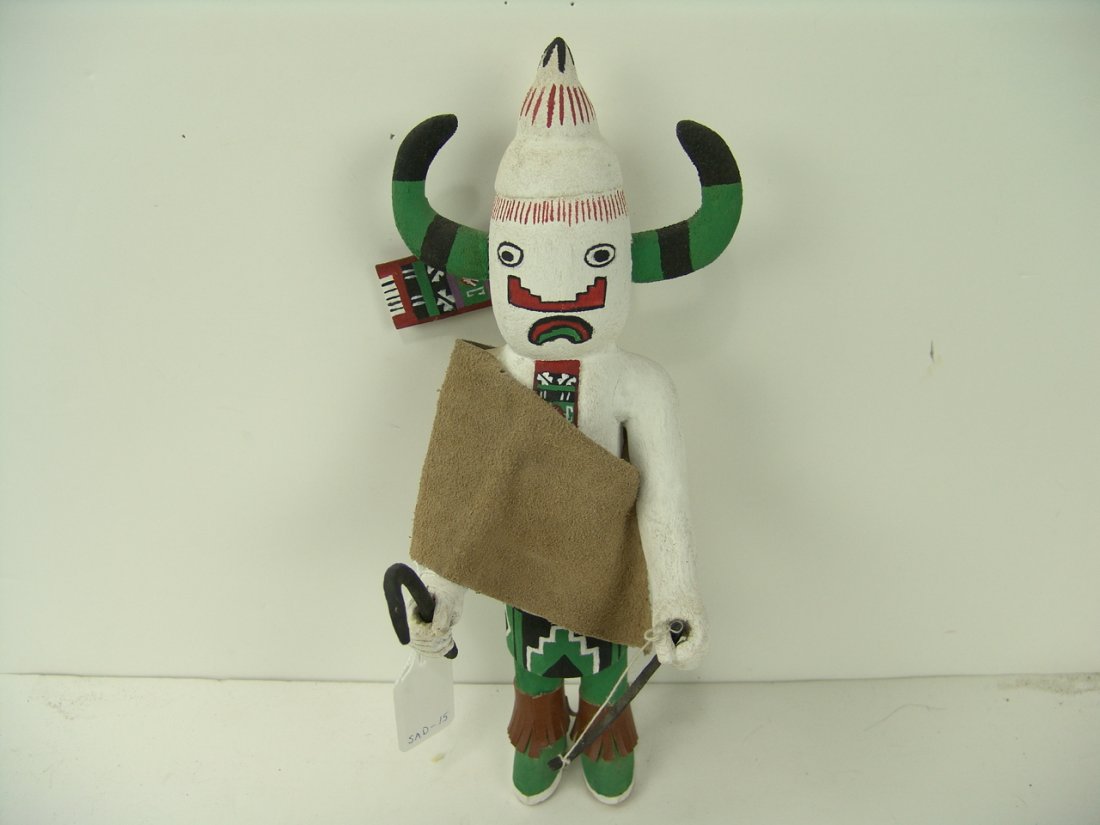 Hopi Katsina: Hand carved and painted Hopi cottonwood root katsina doll. Good condition, some missing pieces. Size: 14" tall Circa: 1970s