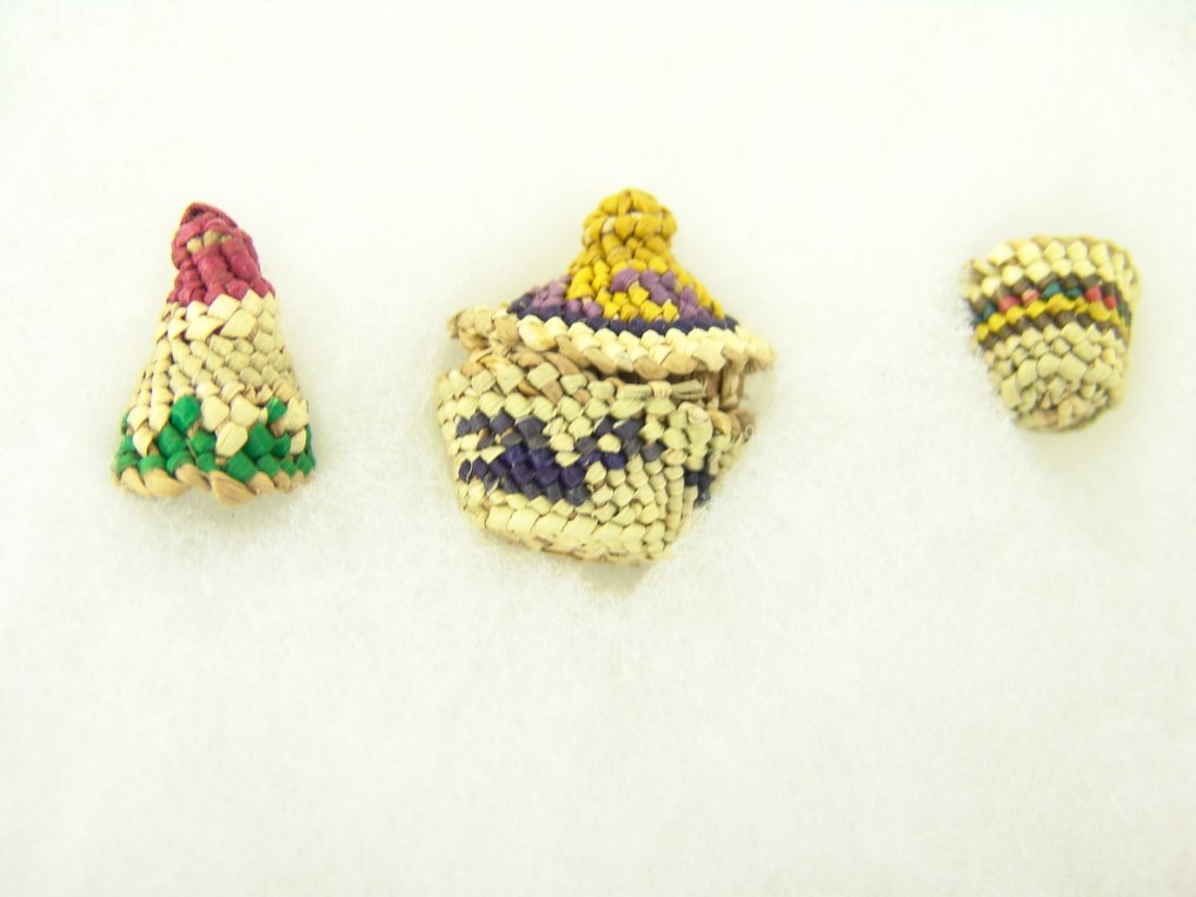 3 Miniature Baskets: Collection of 3 very rare miniature Makah/Nuu-chah-nulth baskets - one lidded and one cone shaped. All in very good condition. Size: 1" x 1" largest Circa: