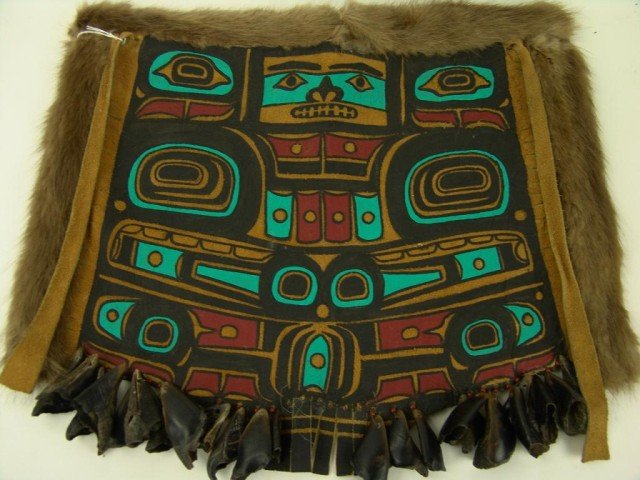 Haida Dance Apron: Hand painted beaver trim Haida dance apron with dew claw suspensions. Circa: 1970s Size: 16" x 20"