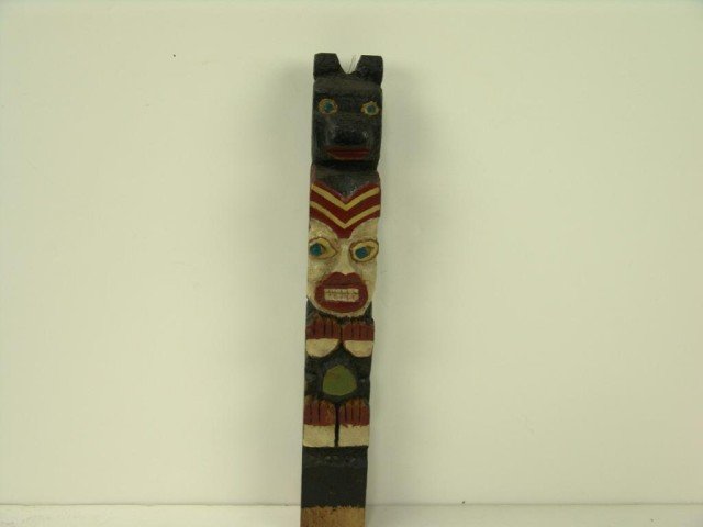 Totem Pole: Old hand carved cedar totem pole. Circa: 1950 Size: 12" tall