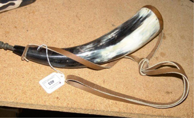 Powderhorn: Old civil war style powderhorn with hand carved tip and base. Circa: Circa 1980s Size: 13-1/2" long