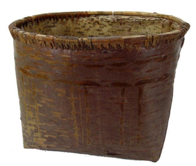 Iroquoise Bark Basket: Very nice early example of a shaped and sewn birch bark basket with incised exterior body. Very good condition, rim intact but missing stitches, beautiful patina. Circa: Early 1900s Size: 10" x 14"