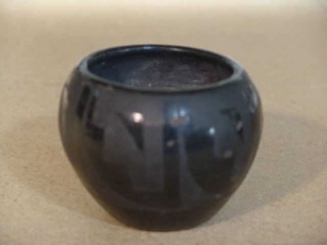 San Ildefonso Pottery Jar: Traditional San Ildefonso black on black pottery jar. Circa: 1930 Size: 4" x 3"