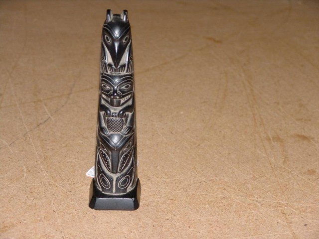 Totem Pole Boma Cast: Famous cast composite argellite totem pole. Circa: 1950s Size: 8-1/2" tall
