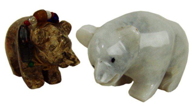 2 Zuni Carvings: A classic hand carved bear fetish with medicine bundle plus a larger white alabaster bear cub. Both in excellent condition. Circa: Early 2000s Size: 2" x 3"