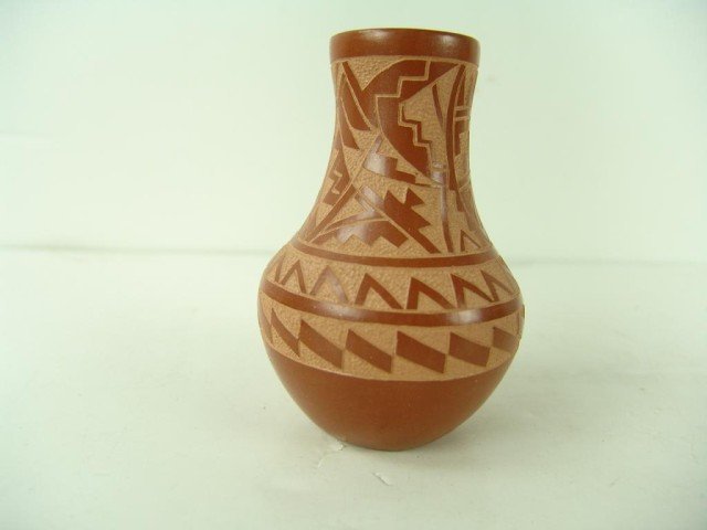 Jemez Miniature Pottery Jar- S. Madalena: Beautiful stretched neck redware vase with more traditional design done in sgraffitto. Excellent condition. Circa: Late 1900s Size: 4-1/2" x 2-3/4"