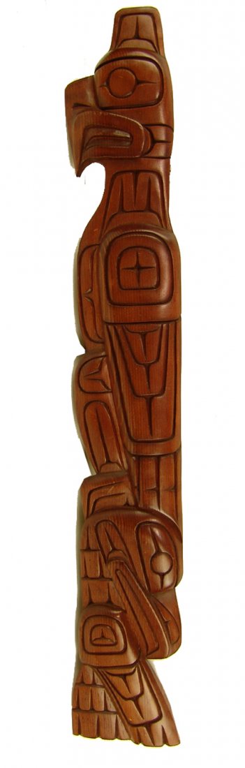 Northwest Coast Thunderbird Carving - David Paull: Fine hand carved and stained red cedar wall hanging showing a thunderbird and eagle in opposed profile. Very good condition. Circa: 1988 Size: 3-1/2" x 24"