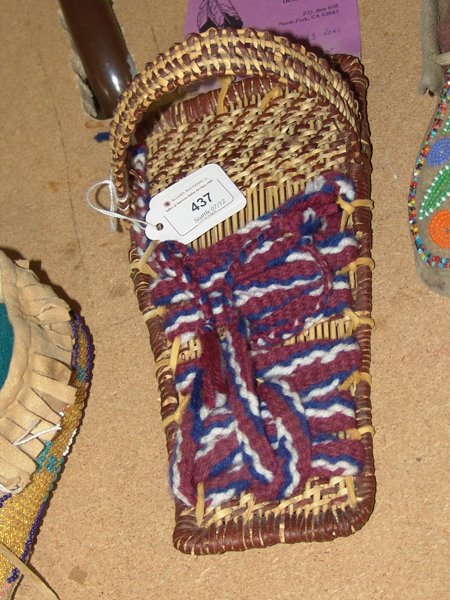 Mono Basketry Cradle - Tracey Williams: Mono toy basketry cradle with woven strapping by Tracey Williams. Circa: 1970s Size: 10" x 4"