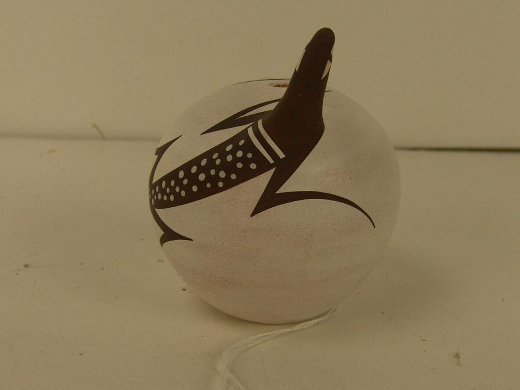 Zuni Lizard Seed Pot - Anderson Peynetia: Very nice lizard seed pot by Anderson Peynetia from Zuni. Circa: 1993 Size: 3-1/2" x 3"