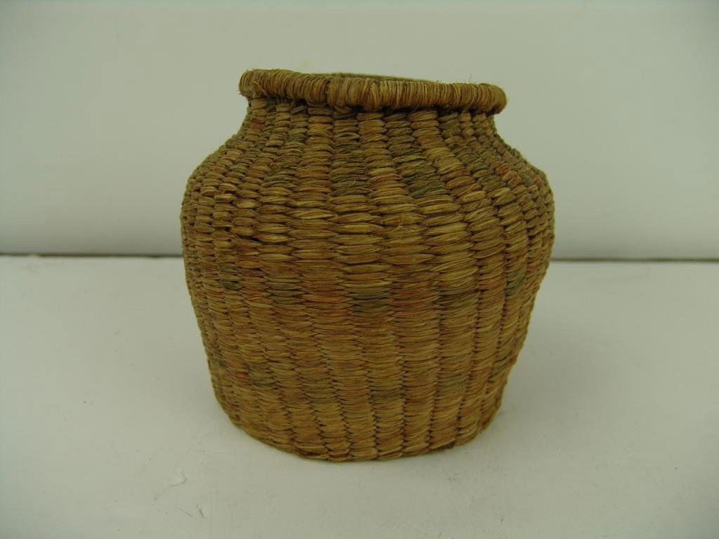 Quinault Basket: Rare Quinault basketry covered ginger jar . Circa: 1920 Size: 6" x 5"