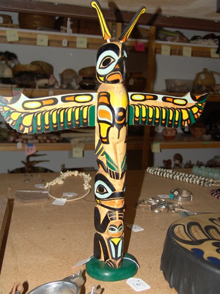 Totem Pole - Lincoln Wallace: Outstanding hand carved Northwest Coast totem pole with removeable parts. Very good condition. Made by Lincoln Wallace. Circa: 1940s Size: 17" tall