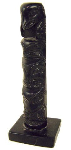 Haide Argellite Totem Pole: Classic hand carved Haida 4-figure stone pole on an argellite base. Very good condition, even the back is carved. Circa: Mid 1900s Size: 6" tall + base