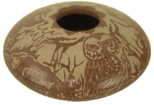 Santa Clara Pottery Jar- Paul Naranjo: Very fine sgraffitto redware pottery seed jar with elaborate designs including katsina dancers, animals, foliage, etc. Very good condition. Circa: Late 1900s Size: 2-1/2" x 4-1/2"