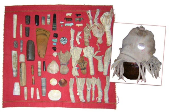 Navajo Medicine: Navajo pottery bowl with 26 pieces of personal medicine; 10 hide bags with 20 pieces of stone medicine, 5 carved fetishes, bull roar, and stone knife. Circa: Various ages Size: Stone knife 5"