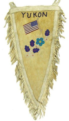 Tlingit Beaded Pennant: Unique triangular design moose hide wall decoration with fine American flags, florals and "Yukon" beaded on the front. Very good condition. Circa: 1940s Size: 25" x 12"