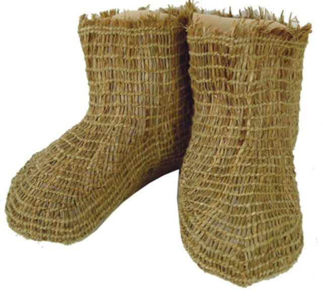 Eskimo Basketry Boots: Rare pair of openweave basketry sock or booties in very good condition. The only pair we have ever had. Circa: Early 1900s Size: 10-1/2"