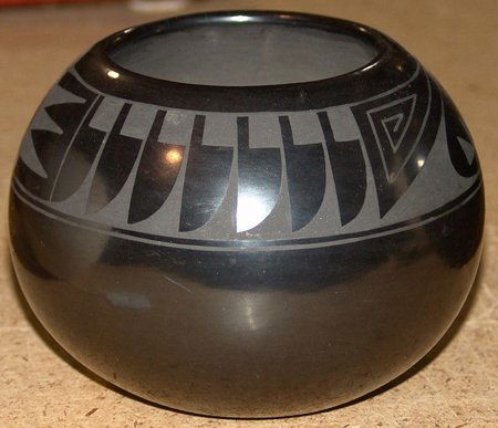 San Ildefonso Bowl - Elvis "Tsee-Pin" Torres: Small and beautiful San Ildefonso black-on-black pottery bowl with traditional radiating feather design. Very good condition. By Elvis "Tsee-Pin" Torres. 4" x 5"