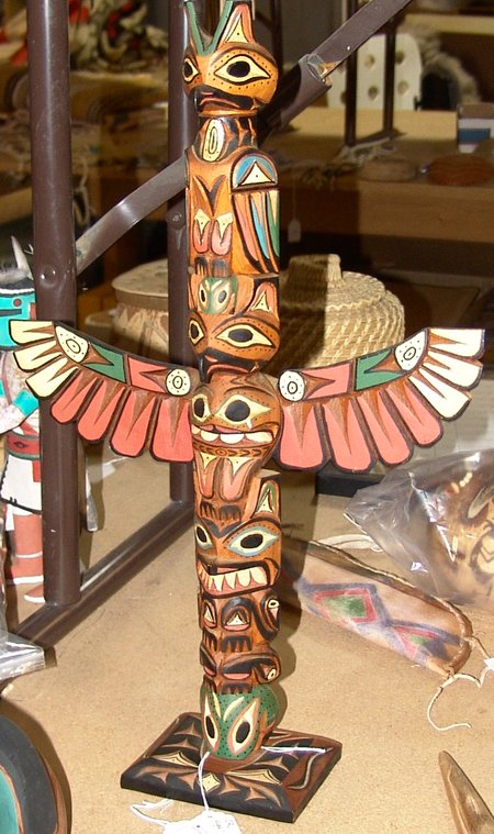 Ralph Francis Totem Pole: A deep relief carved Northwest Coast totem pole by Ralph Francis, Vancouver BC 1950. Kwakiutl. 19 x 2"