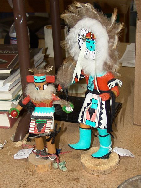 2 Kachina's: Two hand carved and painted Hopi katsina dolls - "sun man" and "peeking out man corn". 12 x 6"