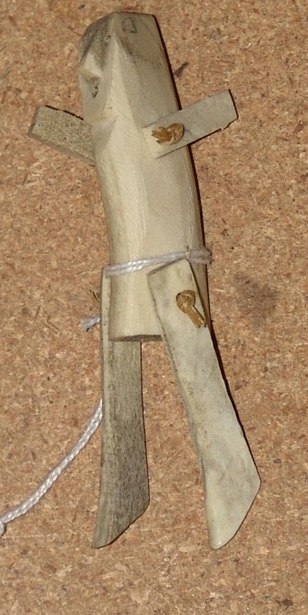 NWC Mini Totem: Eskimo made bone doll, with articulating arms and legs. 3 3/4 x 3/4