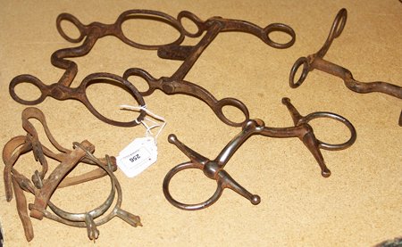 4 Misc Bits and English spurs: Collection of great old Western horse bits and a pair of English spurs.