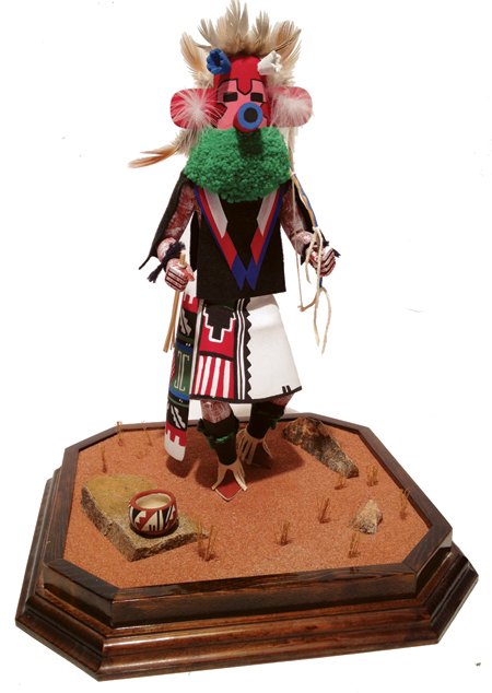 Hopi Katsina Doll - Brent Naha: Ca. 1970, Excellent, beautifully carved and painted "Velvet Shirt" katsina figure with fine detail; in glass show case. 12" tall, case 16" x 11"