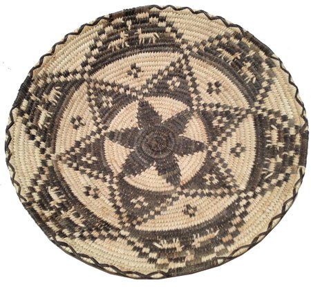 Yavapai Basket: Ca. 1950, Outstanding bowl-shaped basket with coyote tracks, concentric start motifs, and multiple dogs around rim. 10-1/4" x 1-5/8"
