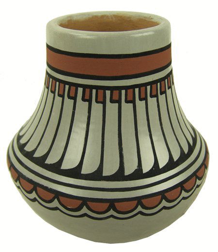 San Ildefonso Pottery Jar - Blue Corn: Ca. 1980s, Very fine polychrome jar with intricate feather motif and scalloped features on a buff slip. Very good condition. 5-1/2" x 5"