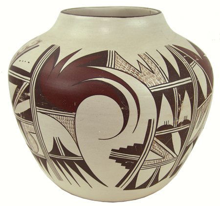 Hopi Pottery Jar - Frog Woman (Joy Navasie): Ca. 1960s, Extra large polychrome pottery jar with her typical avian forms on a buff slip. Good condition, shows use, a number of scuffs and scratches and a rim chip that has been glued. 11" x 13"