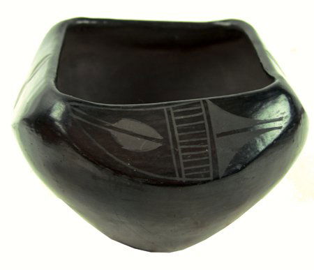 San Ildefonso Pottery - Santana Roybal Martinez: Mid 1900s, Rare, square-rimmed, black-on-black pottery vessel with traditional curvilinear forms. Very good condition, shows some handling. 5" x 7"
