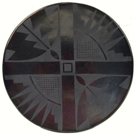 San Ildefonso Pottery Plate - Marie & Julian: Ca. 1950s, Classic black-on-black pottery plate with traditional stylized motif. Very good condition, a few scratches. 10-1/2"