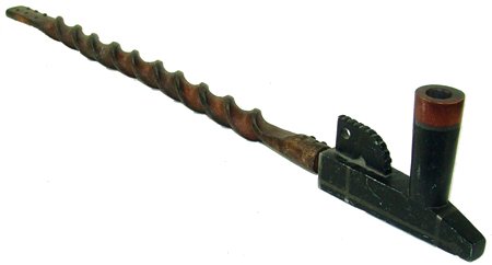 Plains Pipe & Stem: Various ages, Beautiful, early 1900s, carved black stone and catlinite pipe head inlaid with pewter, plus a vintage wooden twist stem. Vary good condition. 25" x 5-1/2"