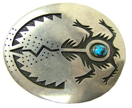 Hopi Belt Buckle - Manuel & Karen Hoyungowa: 1980, Fine Hopi all-silver overlay belt buckle with a spiritual form with lightning coming from its mouth plus a single Bisbee turquoise stone. Very good condition. 2-1/4" x 3"