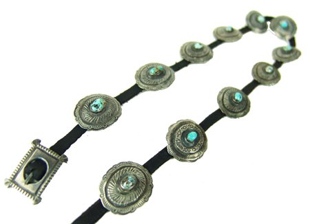 Navajo Miniature Concho Belt: Mid 1900s, A rare, traditionally made, hand-stamped silver concho belt (hat band) with 12 oval conchos, each with a single turquoise stone, plus a great old style buckle. Very good condition. This is 
